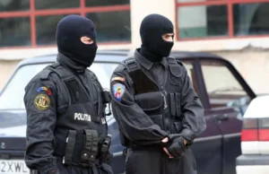percheziții în județele arad