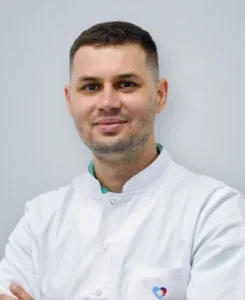 Dr. ANDREI HAJEVSCHI